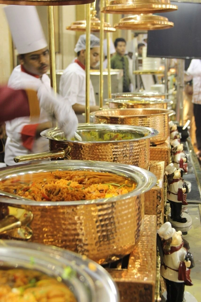 Brass catering counters prepared for an event