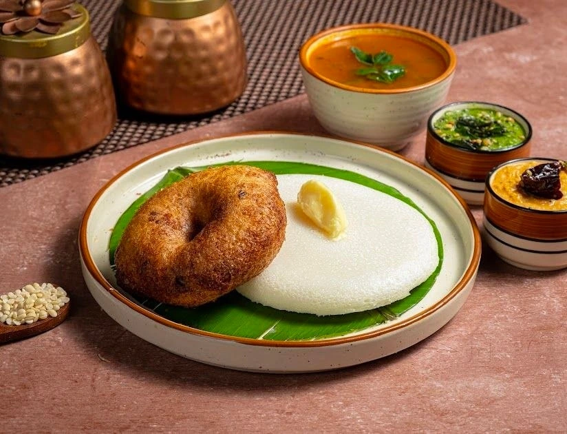 Medu vada served with coconut chutney and sambar
