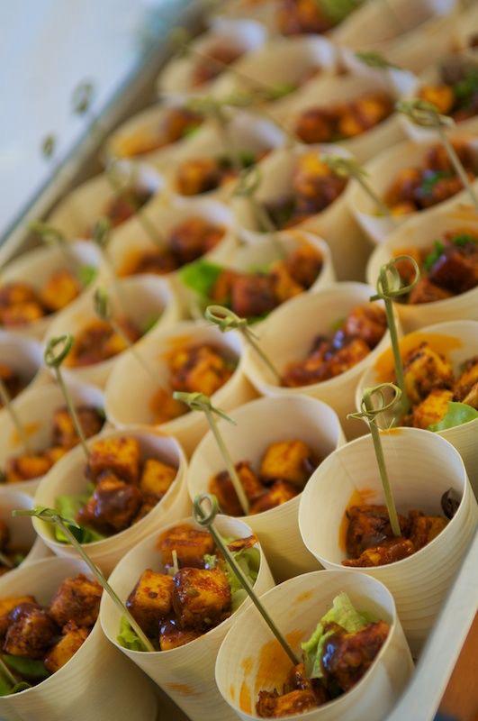 Paneer bites served in individual leaf bowls